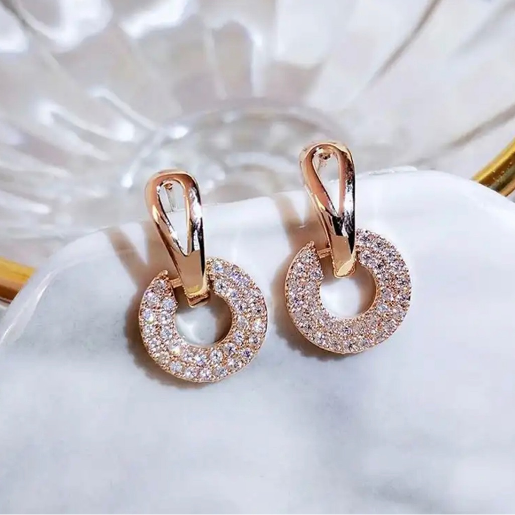 Round Zircon Rose Gold Studs 35$
